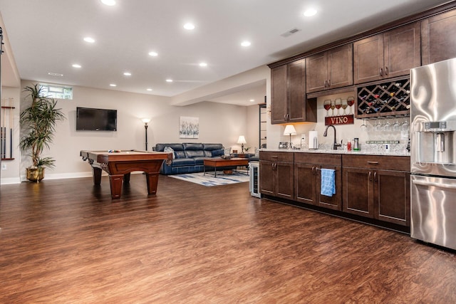 5464 Slater Rdg, Westerville, OH 43082 - kitchen with stainless steel refrigerator with ice dispenser, recessed lighting, dark wood-style floors, dark brown cabinetry, and open floor plan