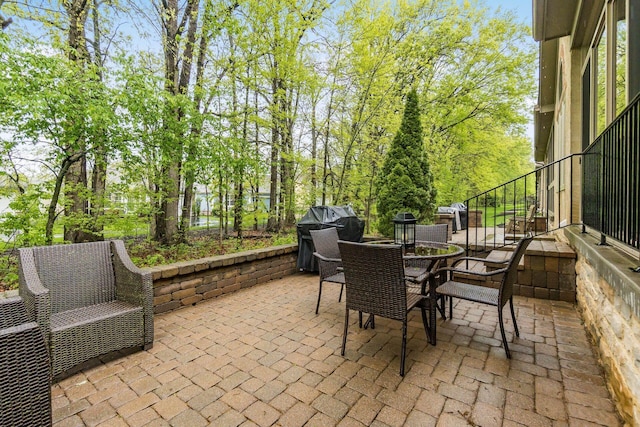 5464 Slater Rdg, Westerville, OH 43082 - view of patio featuring a grill and outdoor dining space