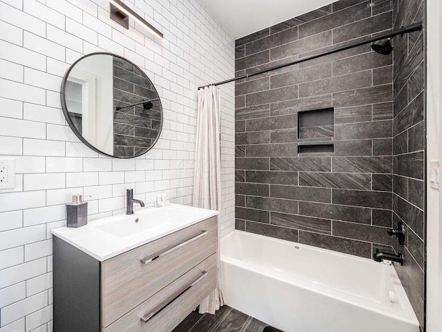 460 S Lane Unit 460, Columbus, OH 43206 - full bathroom with tile walls, vanity, shower / tub combo with curtain, and wood finished floors