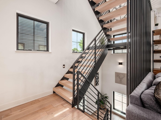 460 S Lane Unit 460, Columbus, OH 43206 - stairway with wood finished floors, baseboards, and a high ceiling