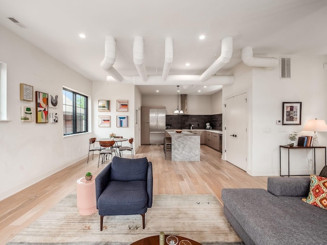460 S Lane Unit 460, Columbus, OH 43206 - living room featuring recessed lighting, light wood-style flooring, and baseboards