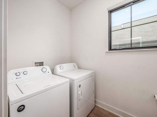 460 S Lane Unit 460, Columbus, OH 43206 - laundry area featuring washing machine and dryer, baseboards, and wood finished floors