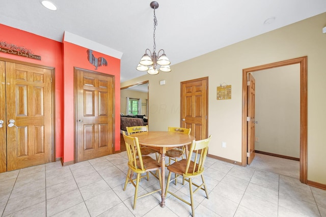 12094 Beech Tree Ct S, Thornville, OH 43076 - dining area featuring baseboards, a chandelier, and light tile patterned floors