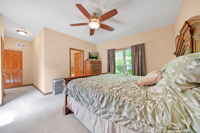 12094 Beech Tree Ct S, Thornville, OH 43076 - bedroom with light colored carpet, baseboards, and a ceiling fan