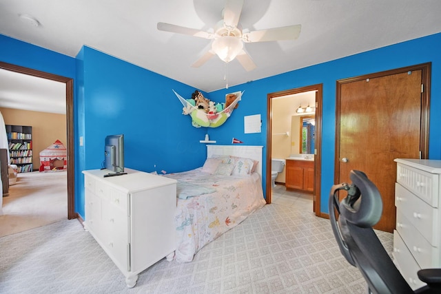 12094 Beech Tree Ct S, Thornville, OH 43076 - bedroom with light carpet, a ceiling fan, ensuite bath, and a closet