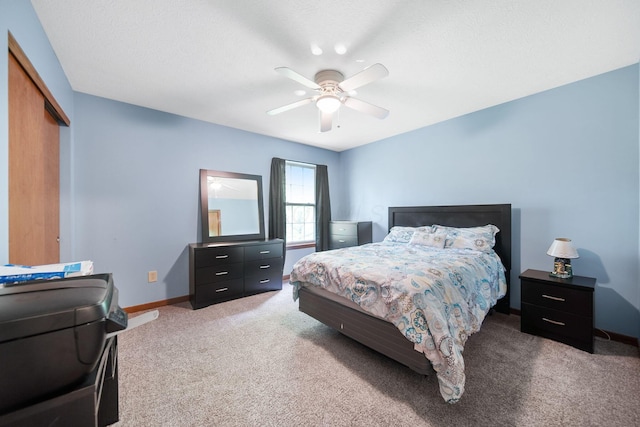 12094 Beech Tree Ct S, Thornville, OH 43076 - bedroom featuring carpet, baseboards, a closet, and ceiling fan