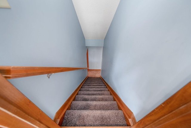 12094 Beech Tree Ct S, Thornville, OH 43076 - stairway featuring baseboards