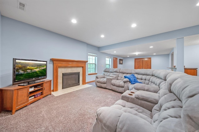 12094 Beech Tree Ct S, Thornville, OH 43076 - living room featuring light colored carpet, recessed lighting, and a tile fireplace