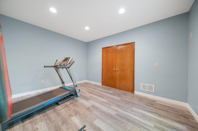12094 Beech Tree Ct S, Thornville, OH 43076 - exercise area featuring wood finished floors, baseboards, and recessed lighting