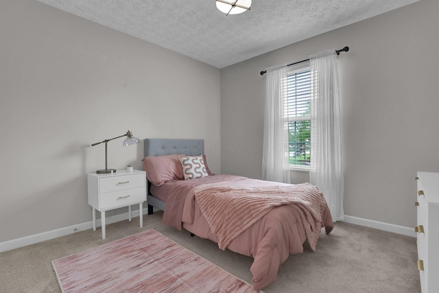 4215 Mack Ct, Powell, OH 43065 - bedroom with light colored carpet, a textured ceiling, and baseboards