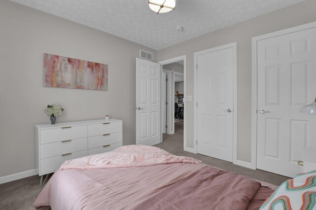 4215 Mack Ct, Powell, OH 43065 - bedroom with carpet floors, baseboards, and a textured ceiling