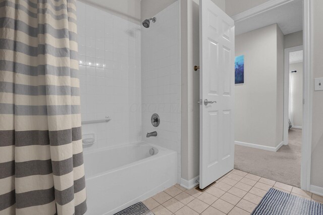 4215 Mack Ct, Powell, OH 43065 - full bathroom featuring tile patterned flooring, baseboards, and shower / bath combo with shower curtain