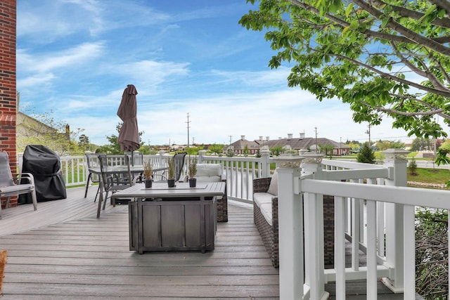 4215 Mack Ct, Powell, OH 43065 - wooden terrace with outdoor dining space and a grill