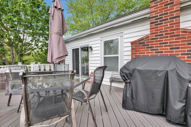 4215 Mack Ct, Powell, OH 43065 - wooden deck featuring outdoor dining area and grilling area