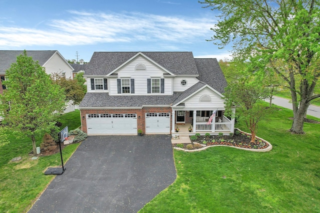 4215 Mack Ct, Powell, OH 43065 - traditional-style home with a porch, an attached garage, asphalt driveway, a shingled roof, and brick siding