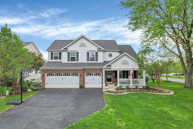 4215 Mack Ct, Powell, OH 43065 - view of front of house featuring a porch, a garage, asphalt driveway, a front lawn, and a shingled roof