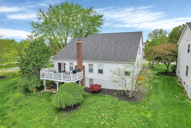4215 Mack Ct, Powell, OH 43065 - back of house with a chimney, a wooden deck, a yard, and a shingled roof