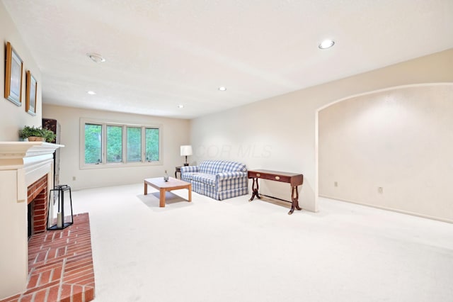 685 Dogwood Ln, Newark, OH 43055 - living area with carpet, recessed lighting, and a brick fireplace