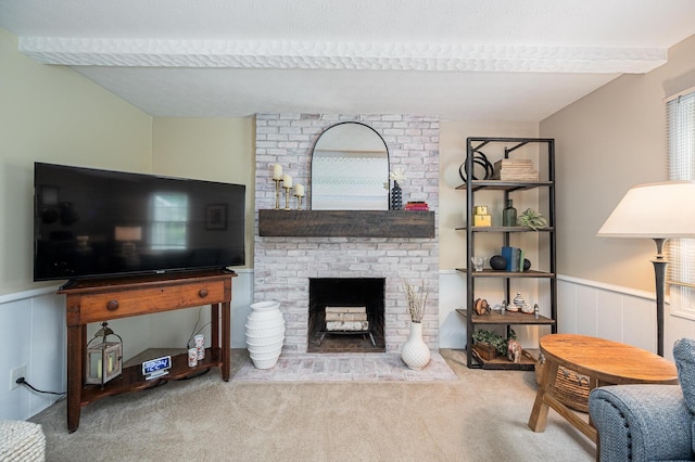 1211 Darcann Dr, Columbus, OH 43220 - carpeted living area featuring a brick fireplace and a wainscoted wall