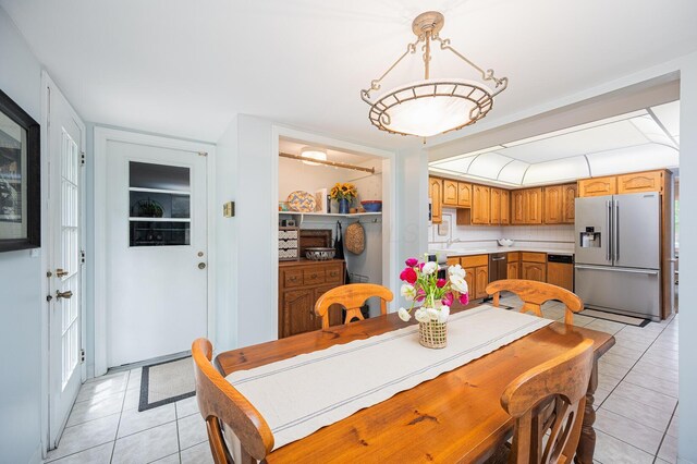 1211 Darcann Dr, Columbus, OH 43220 - dining room featuring light tile patterned floors