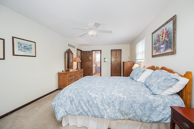1211 Darcann Dr, Columbus, OH 43220 - bedroom featuring carpet flooring, baseboards, a ceiling fan, and connected bathroom