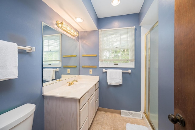 1211 Darcann Dr, Columbus, OH 43220 - bathroom with a stall shower, toilet, tile patterned flooring, and baseboards