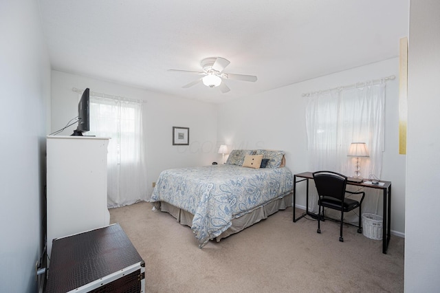 1211 Darcann Dr, Columbus, OH 43220 - bedroom featuring light carpet and a ceiling fan