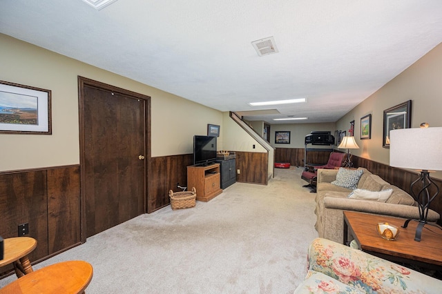1211 Darcann Dr, Columbus, OH 43220 - living room with wooden walls, wainscoting, and light carpet