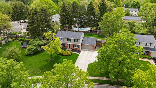 1211 Darcann Dr, Columbus, OH 43220 - aerial view of residential area with a tree filled landscape