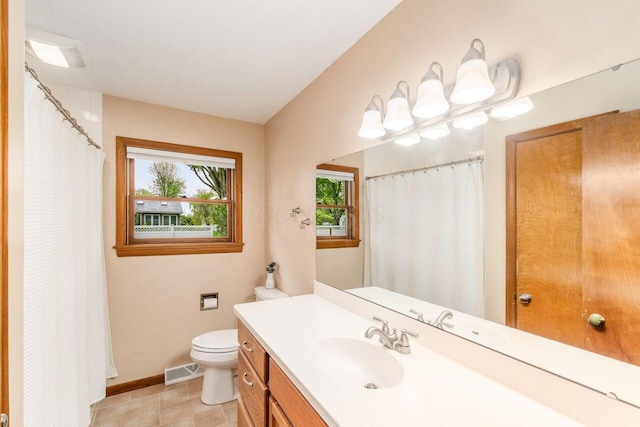 2040 Riggs Rd, Newark, OH 43055 - bathroom with toilet, vanity, baseboards, tile patterned floors, and curtained shower