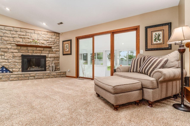 2040 Riggs Rd, Newark, OH 43055 - carpeted living room featuring vaulted ceiling and a stone fireplace