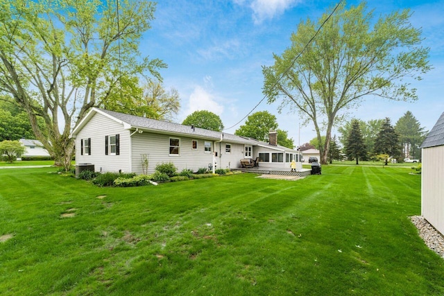 2040 Riggs Rd, Newark, OH 43055 - back of house with a lawn and central AC unit
