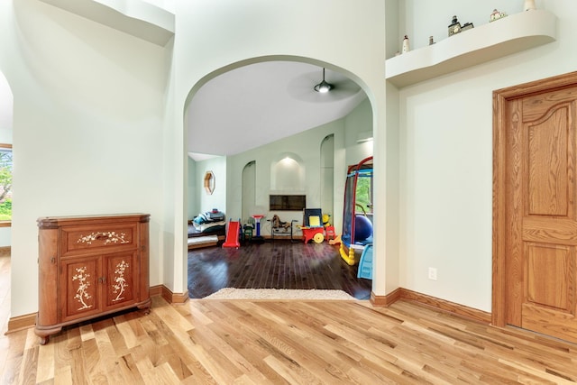3100 Kropp Rd, Grove City, OH 43123 - foyer with a towering ceiling, light wood-style flooring, ceiling fan, arched walkways, and baseboards