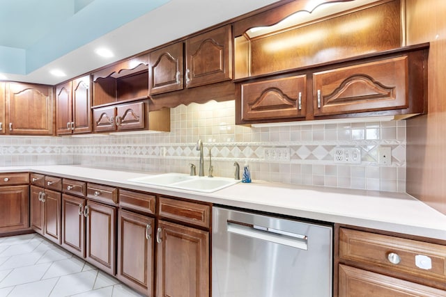 3100 Kropp Rd, Grove City, OH 43123 - kitchen with dishwasher, a sink, backsplash, light countertops, and recessed lighting