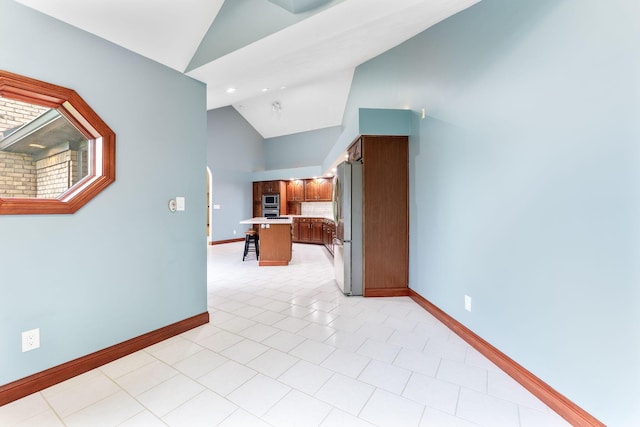 3100 Kropp Rd, Grove City, OH 43123 - hallway featuring lofted ceiling, baseboards, light tile patterned floors, and recessed lighting
