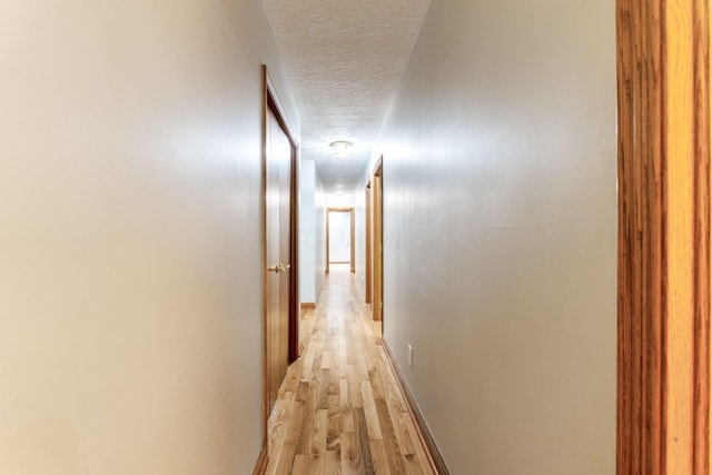 3100 Kropp Rd, Grove City, OH 43123 - corridor with a textured ceiling and light wood finished floors