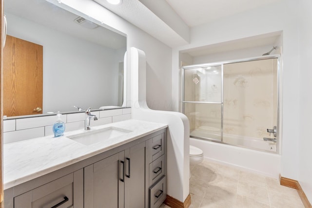 3100 Kropp Rd, Grove City, OH 43123 - full bath with toilet, vanity, shower / bath combination with glass door, and tile patterned floors