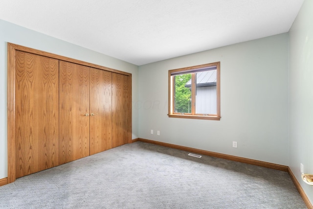 3100 Kropp Rd, Grove City, OH 43123 - unfurnished bedroom featuring carpet flooring, baseboards, and a closet