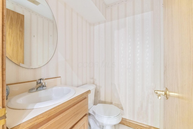 3100 Kropp Rd, Grove City, OH 43123 - bathroom with wallpapered walls, toilet, and vanity