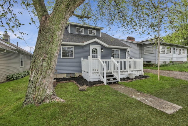 193 Seymour Ave, Buckeye Lake, OH 43008 - view of front of home featuring a front lawn and a shingled roof