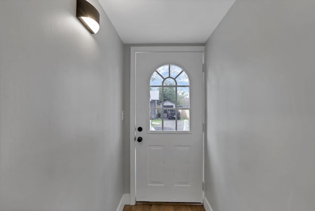 193 Seymour Ave, Buckeye Lake, OH 43008 - doorway featuring baseboards and wood finished floors
