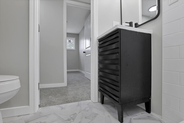 193 Seymour Ave, Buckeye Lake, OH 43008 - bathroom with toilet, baseboards, and marble finish floors