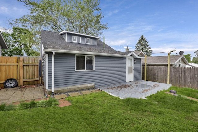 193 Seymour Ave, Buckeye Lake, OH 43008 - back of property with a patio area and a shingled roof