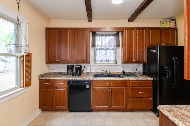 kitchen featuring black appliances, a sink, beamed ceiling, and healthy amount of natural light