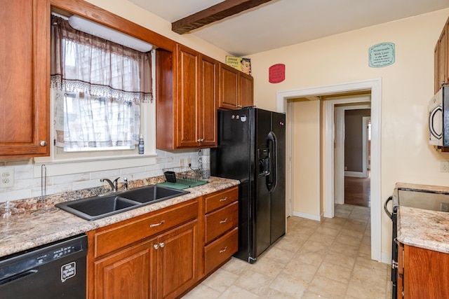 kitchen with black appliances, a sink, brown cabinets, backsplash, and beam ceiling