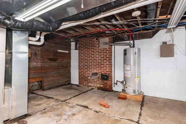 unfinished basement with gas water heater