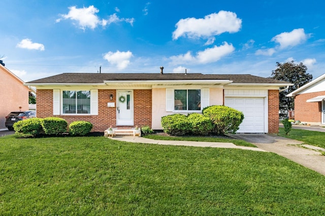 1825 Ormond Ave, Columbus, OH 43224 - single story home with driveway, a garage, a front lawn, and brick siding