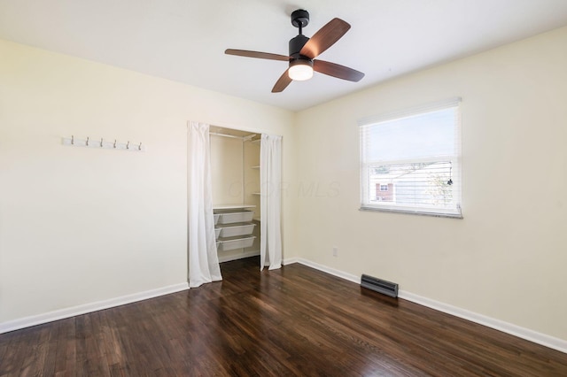 1825 Ormond Ave, Columbus, OH 43224 - unfurnished bedroom featuring dark wood-style floors, baseboards, and a ceiling fan