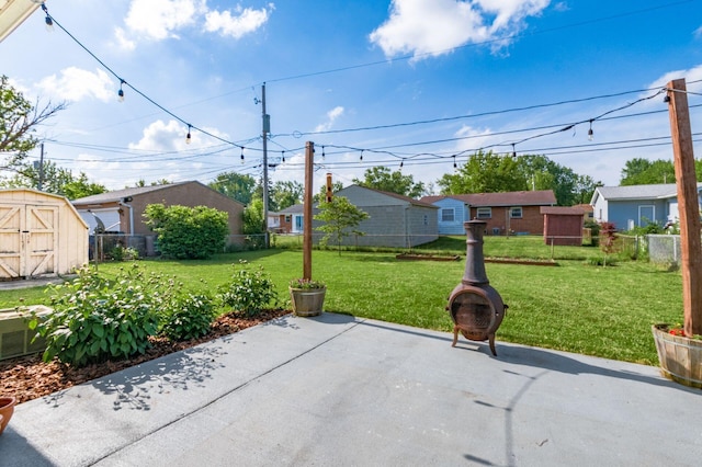 1825 Ormond Ave, Columbus, OH 43224 - view of patio / terrace with a storage unit and an outbuilding