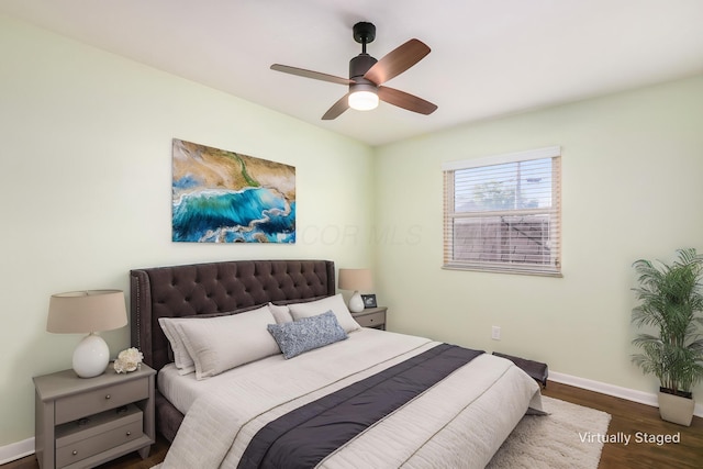 1825 Ormond Ave, Columbus, OH 43224 - bedroom with wood finished floors, baseboards, and ceiling fan